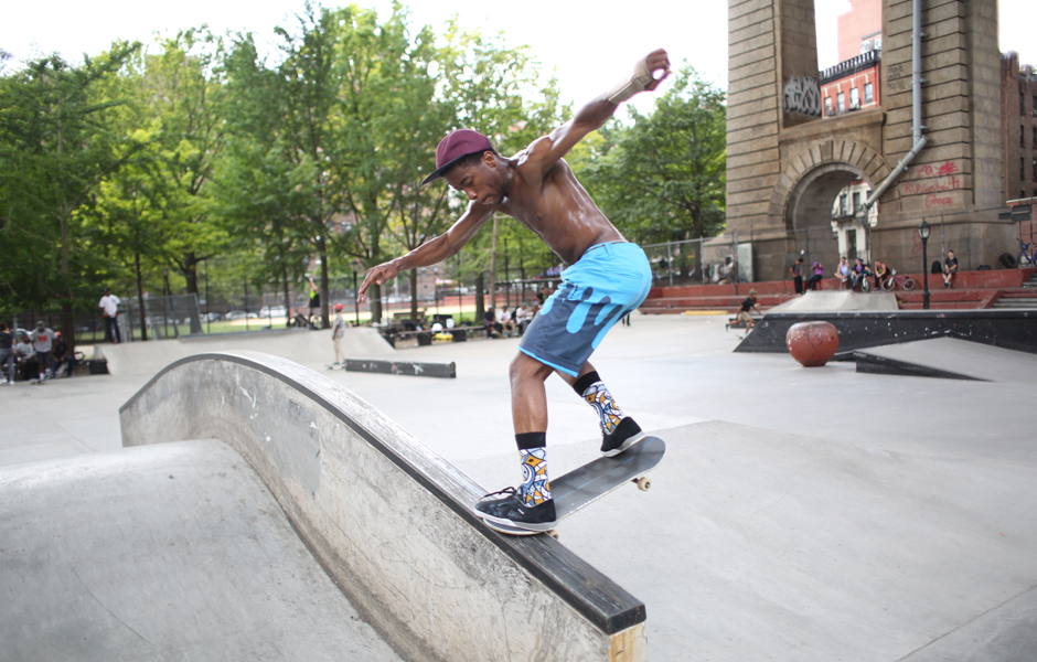 Skateboarder performing a trick at Lower East Side skatepark in New York City captured by photographer Ebis Hernandez