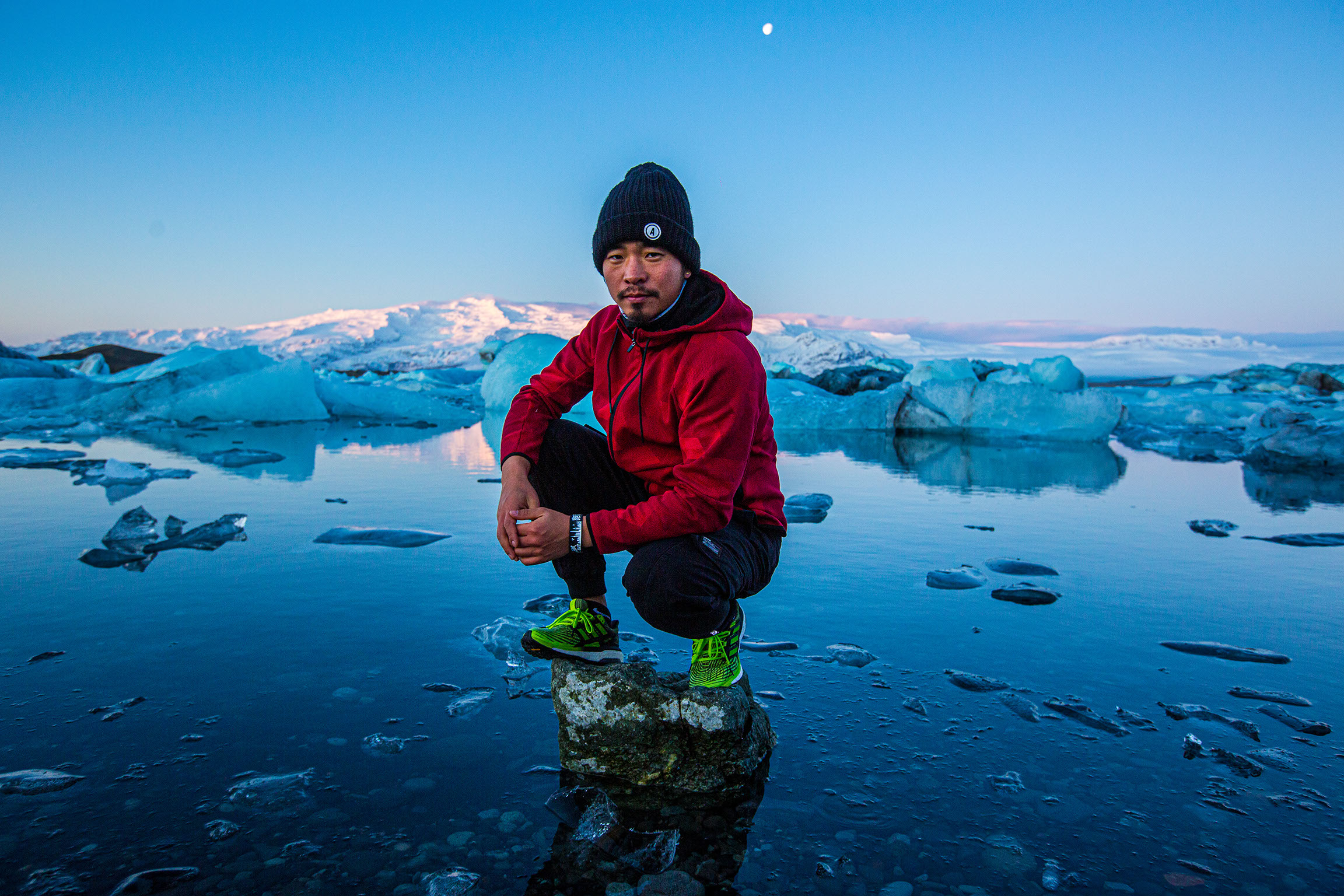 Portrait at Jökulsárlón Glacier Lagoon in Iceland with floating icebergs photographed by Ebis Hernandez