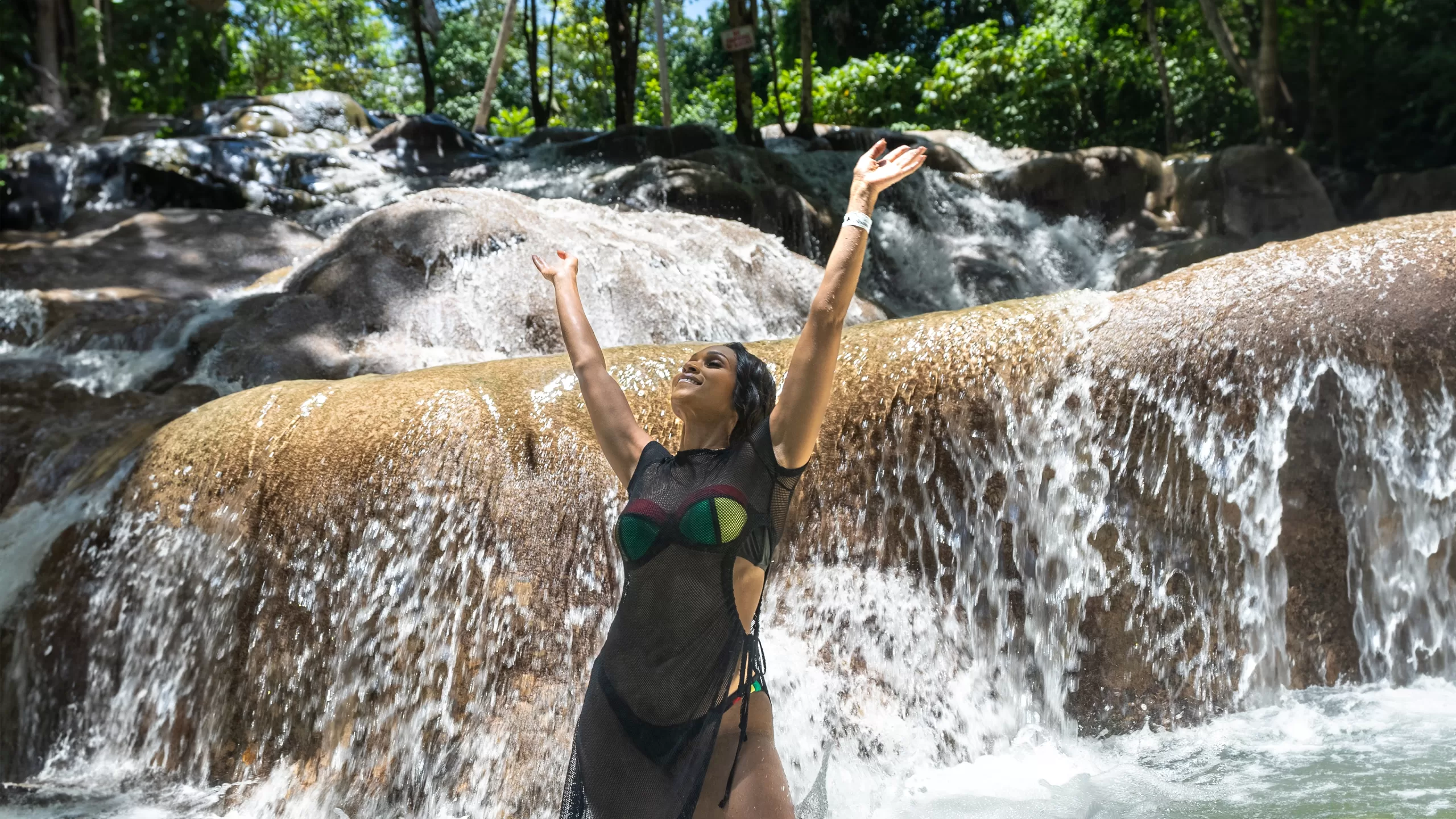 Mellisa L Williams at Dunn’s River Falls waterfall in Jamaica lifestyle travel photography by Ebis Hernandez