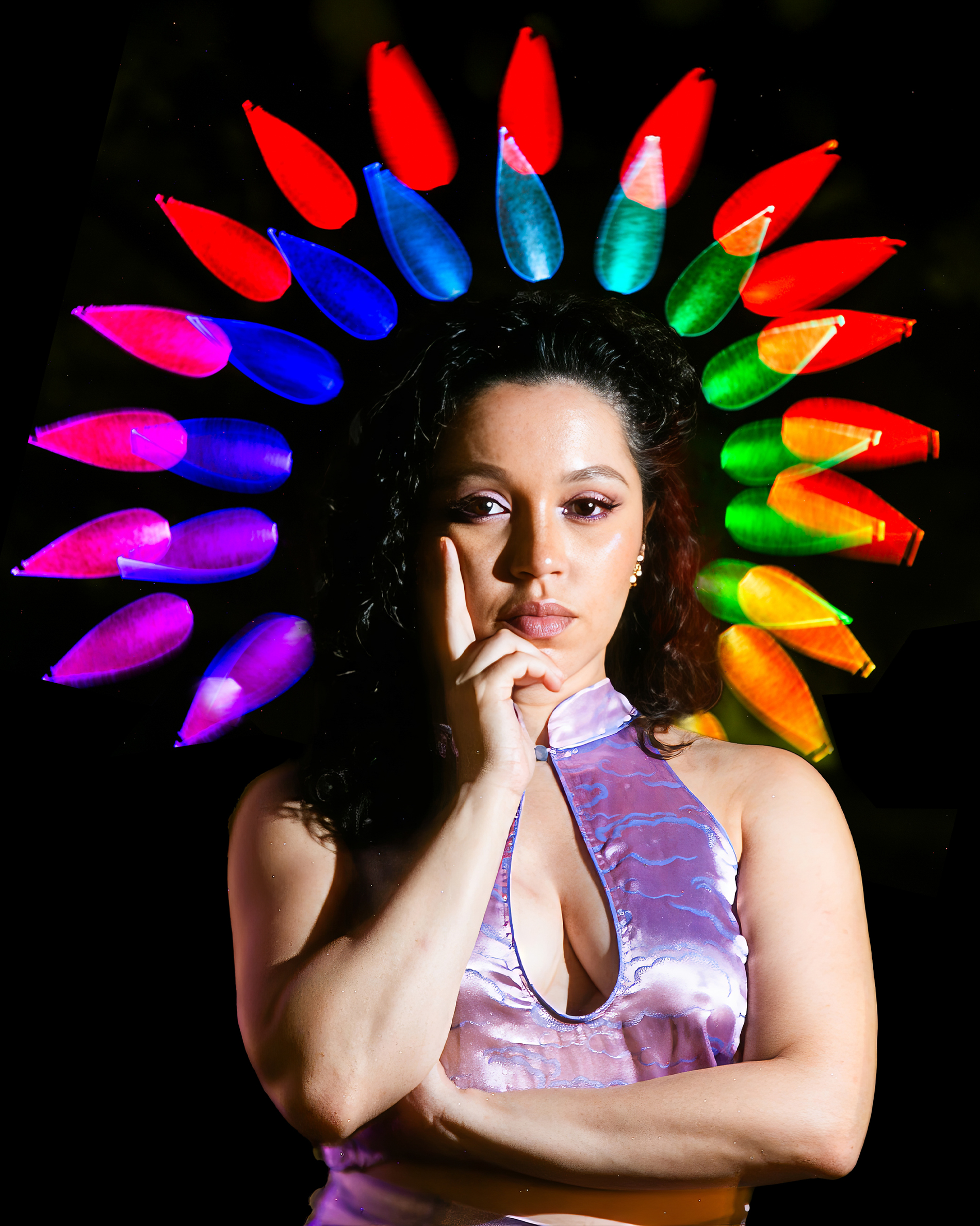 Creative portrait with colorful light ring effect and experimental lighting setup photographed by Ebis Hernandez