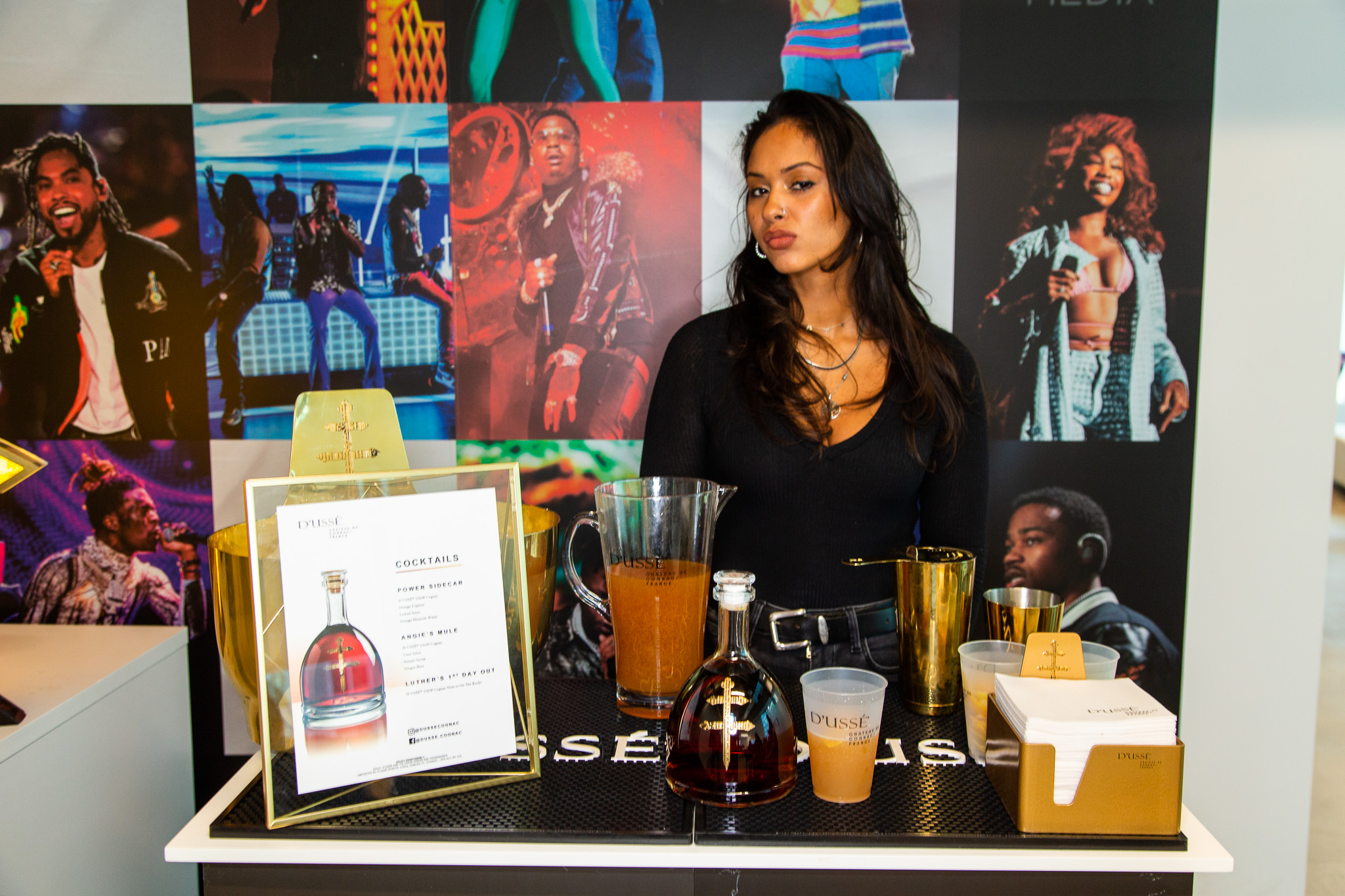 Dusse brand activation display at iHeartRadio event with hospitality setup photographed by Ebis Hernandez