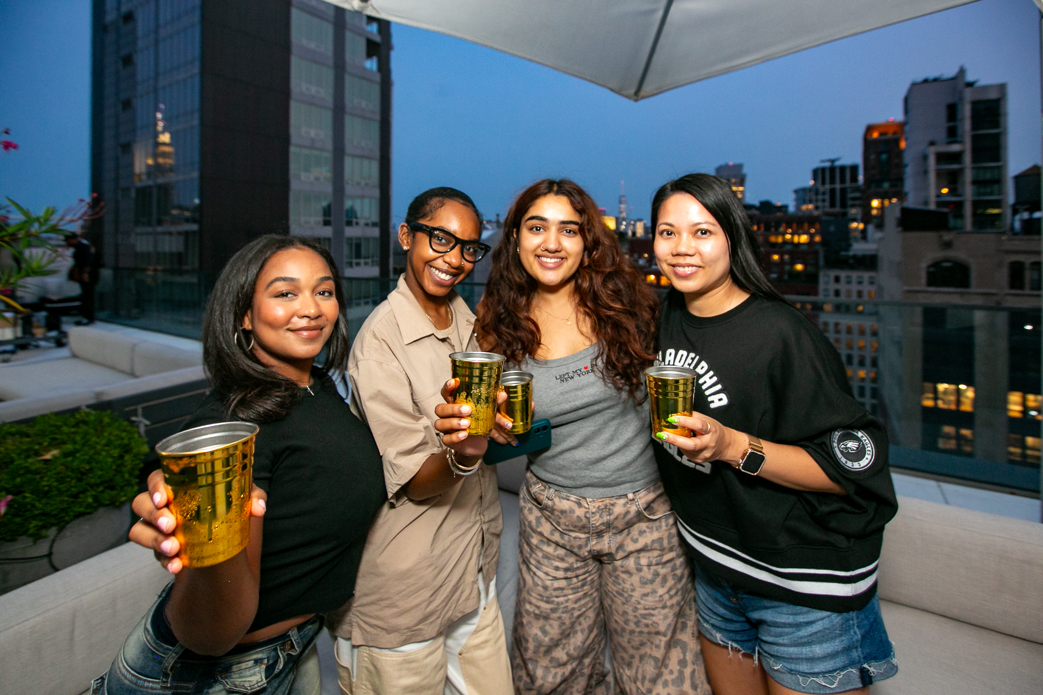 Team photo at Dusse Carte Blanche Roc Nation event showcasing brand experience photographed by Ebis Hernandez