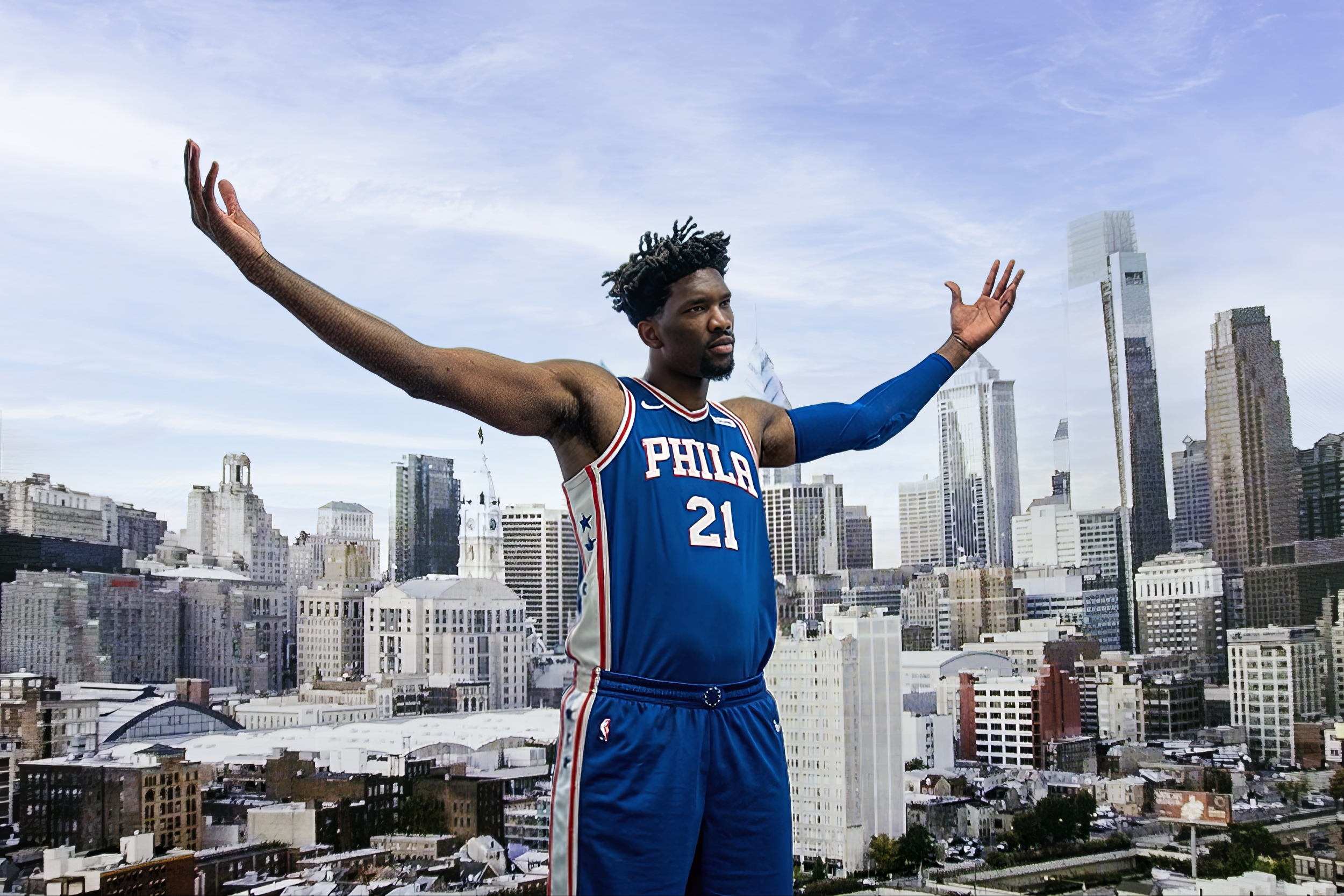 Joel Embiid portrait for Philadelphia 76ers with city skyline background photographed by Ebis Hernandez
