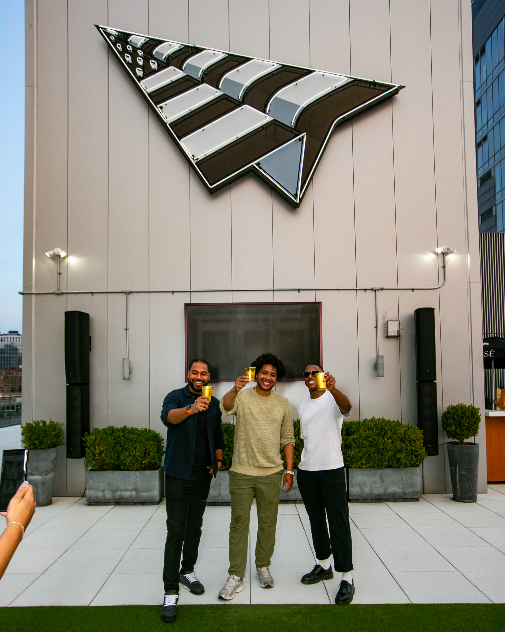 Guests enjoying Dusse Carte Blanche rooftop event hosted by Roc Nation photographed by Ebis Hernandez